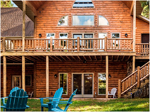 Lasting Memories Lodge (link) picture shows log stairs down to the lake with long pier